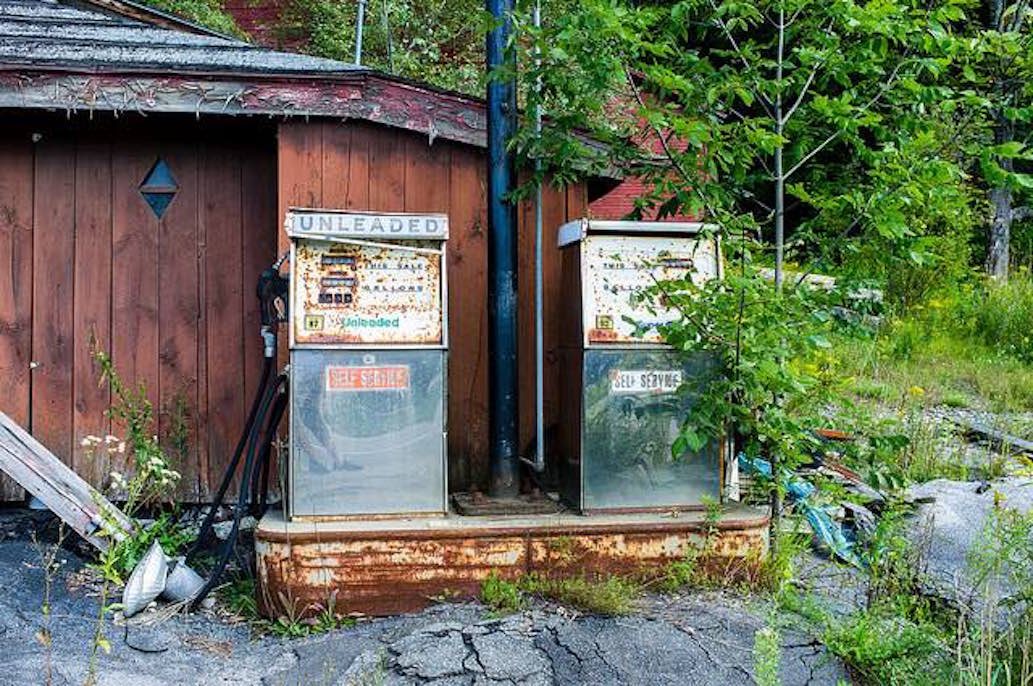 Abandoned pump. What the slump in oil prices means for Big Oil
